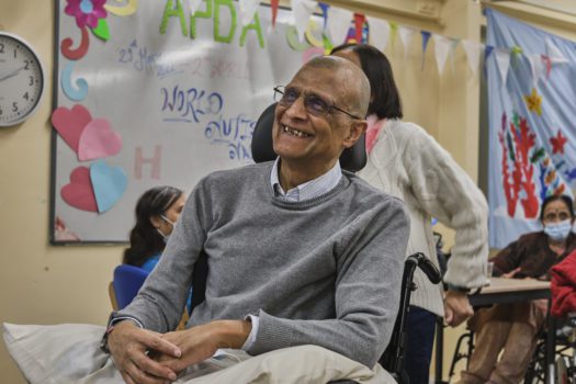 Man smiling in wheelchair